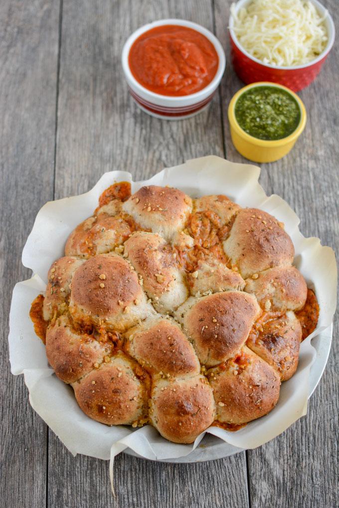 This recipe for Pesto Chicken Pizza Rolls is a fun way to change things up from traditional pizza. Serve them warm or cold for lunch or for an easy appetizer. They're easy to make and kid-friendly as well!