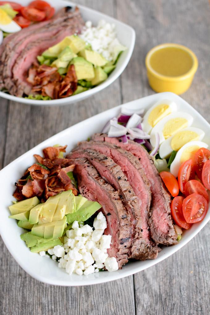 This Steak Cobb Salad Recipe is packed with protein and nutrients, easy to assemble and makes a great lunch or dinner option as the weather gets warmer.