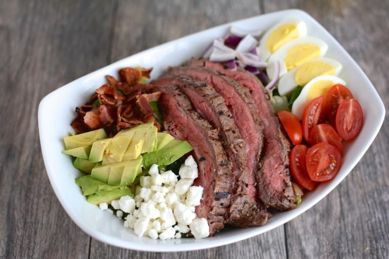 This Steak Cobb Salad Recipe is packed with protein and nutrients, easy to assemble and makes a great lunch or dinner option as the weather gets warmer.