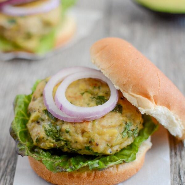 These Avocado Chicken Burgers are an easy weeknight dinner in the oven or on the grill. This recipe is gluten-free, paleo and can easily be made ahead of time during food prep.