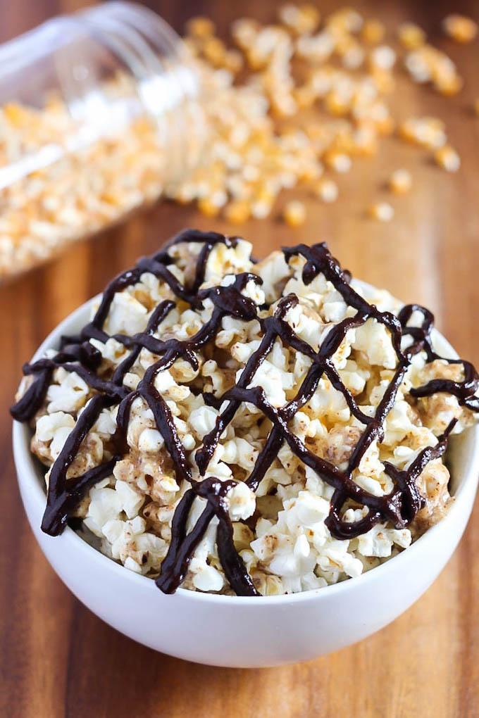 This recipe for vegan, gluten-free Chocolate Almond Butter Popcorn is so easy and makes a perfect healthy movie night dessert! You could even eat it for a snack!