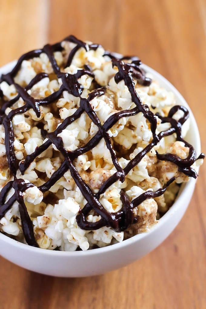 This recipe for vegan, gluten-free Chocolate Almond Butter Popcorn is so easy and makes a perfect healthy movie night dessert! You could even eat it for a snack!