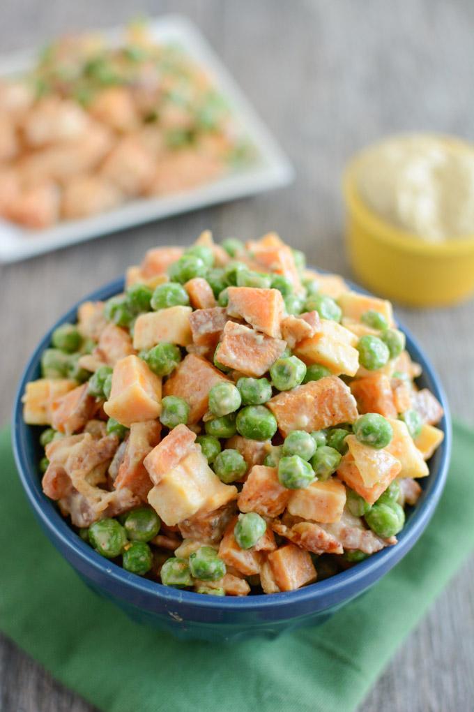 This Pea Salad with Sweet Potatoes is a healthy, kid-friendly recipe the whole family will love for dinner. Covered in hummus and mixed with bacon and cheese, what's not to love about this side dish?