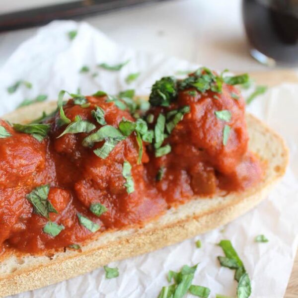 This Mushroom Quinoa Meatball Sandwich recipe is a great meatless alternative to your favorite meatball sub! Enjoy it with a glass of wine for an easy vegetarian dinner!