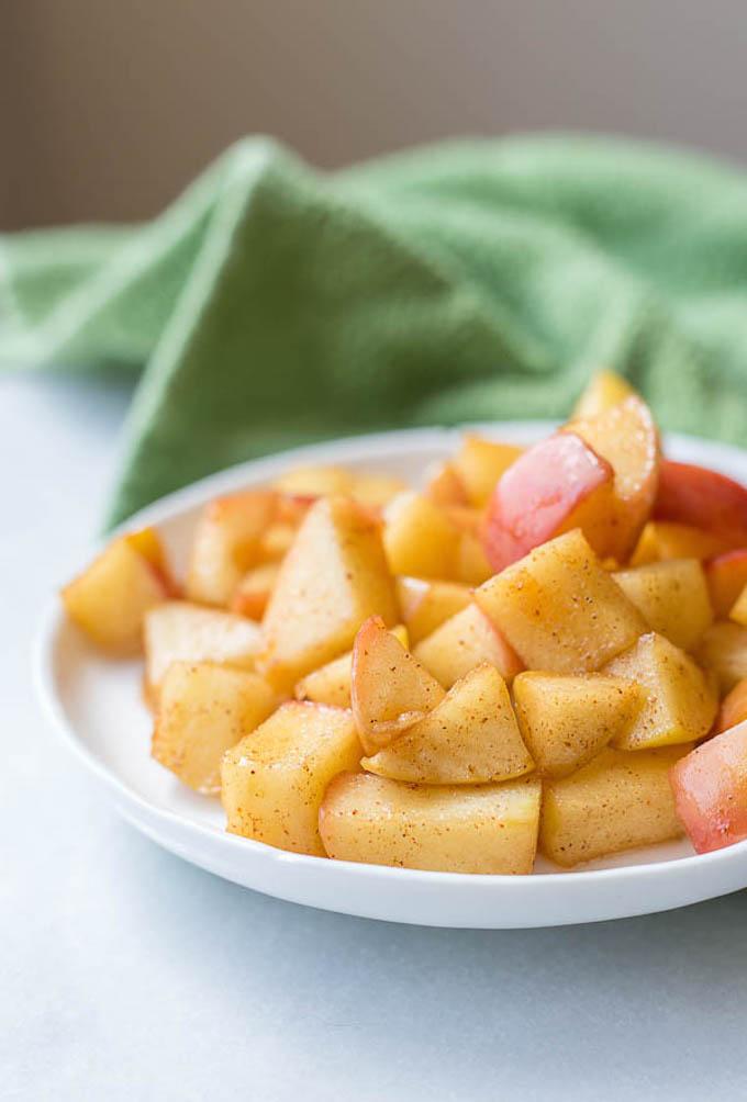 This Caramelized Peach and Quinoa Breakfast Bowl is packed with protein and makes a great summer breakfast.