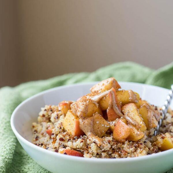This Caramelized Peach and Quinoa Breakfast Bowl is packed with protein and makes a great summer breakfast.