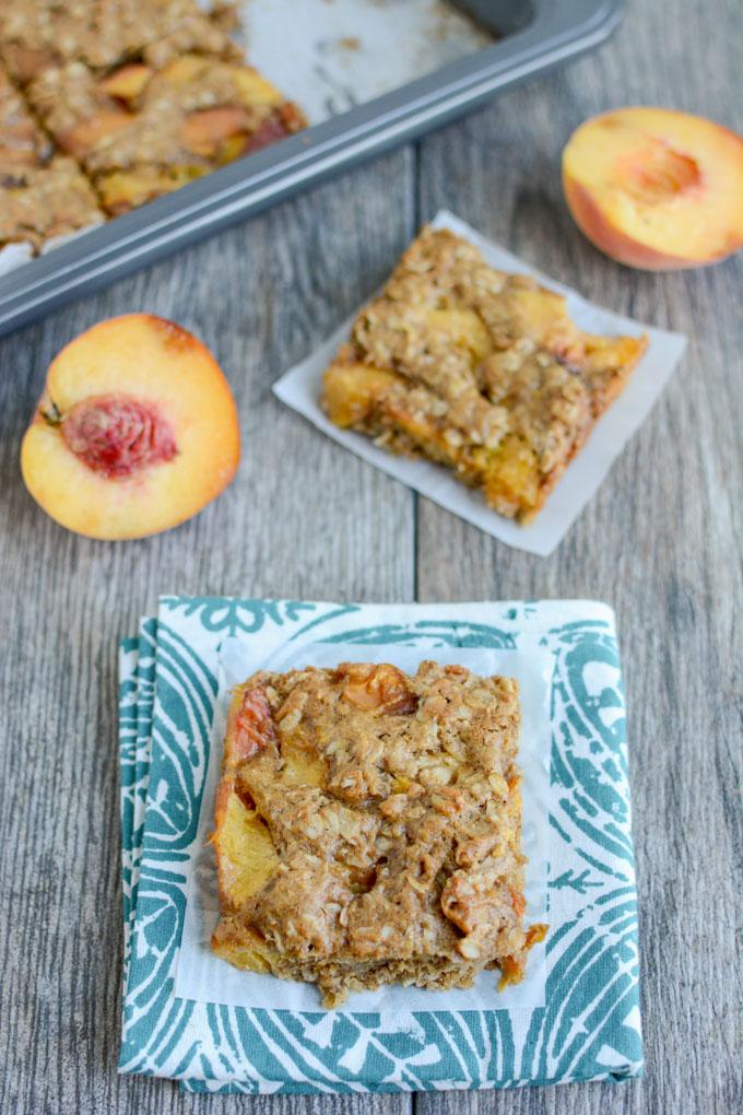 This recipe for Ginger Peach Oat Bars is perfect for a summer dessert. They're packed with fresh, juicy peaches and taste great topped with a scoop of vanilla ice cream!