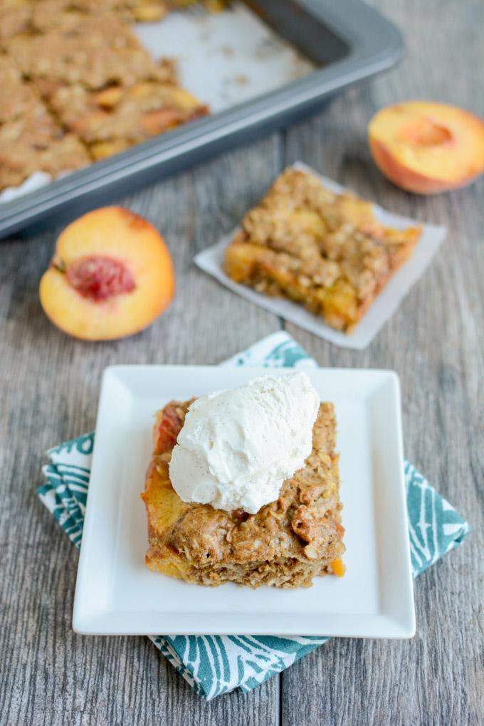 This recipe for Ginger Peach Oat Bars is perfect for a summer dessert. They're packed with fresh, juicy peaches and taste great topped with a scoop of vanilla ice cream!