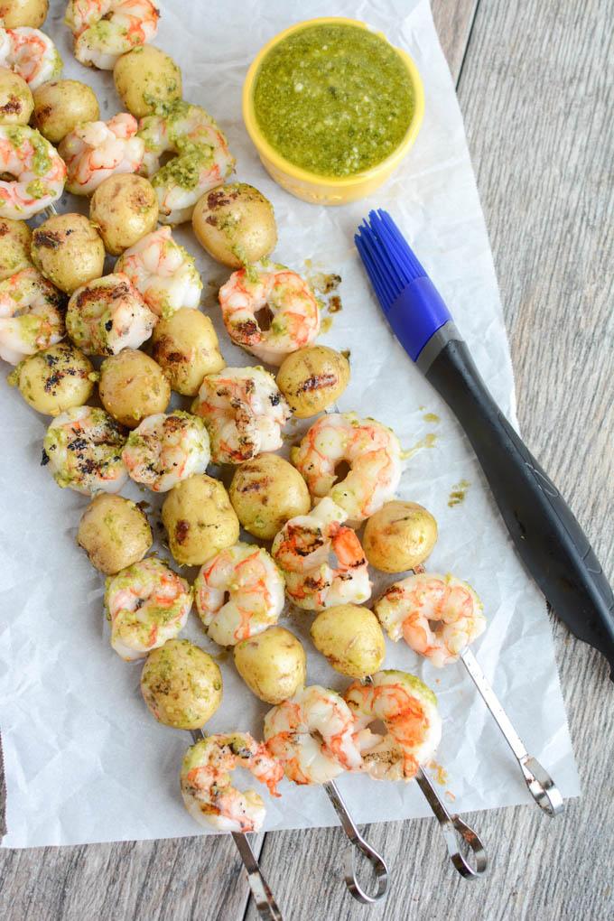 These Pesto Shrimp and Potato Kebabs are made with just a few ingredients and cook quickly on the grill for an easy summer dinner. 