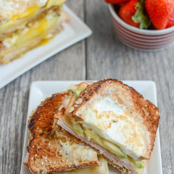 This Egg-In-A-Hole Breakfast Sandwich is a protein-packed, healthy breakfast recipe that's ready in under 5 minutes. The perfect way to start your day!