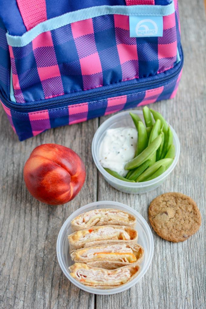 Three tips for assembling Healthy Packable Lunches For Kids that are quick and satisfying to help fuel kids through their busy afternoons!