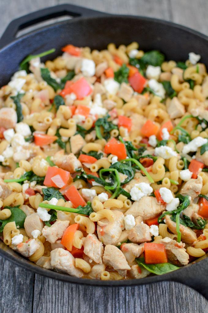 Only one pot required for this Skillet Mediterranean Chicken Pasta! This easy, healthy dinner recipe is the perfect one-pan meal for busy weeknights. 