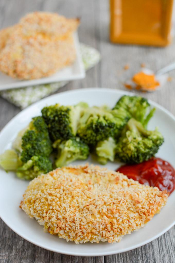 This Turmeric Yogurt Chicken is the perfect food prep recipe. Put the chicken in the marinade ahead of time, then simple coat with breadcrumbs and bake for a quick, healthy dinner!