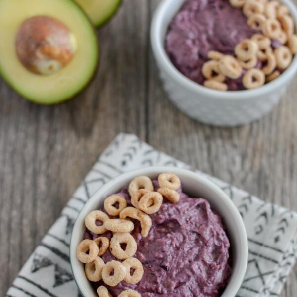 This Blueberry Avocado Smoothie Bowl is packed with nutritious and healthy first foods to give your baby! Plus it's super thick to help them practice their self-feeding skills.