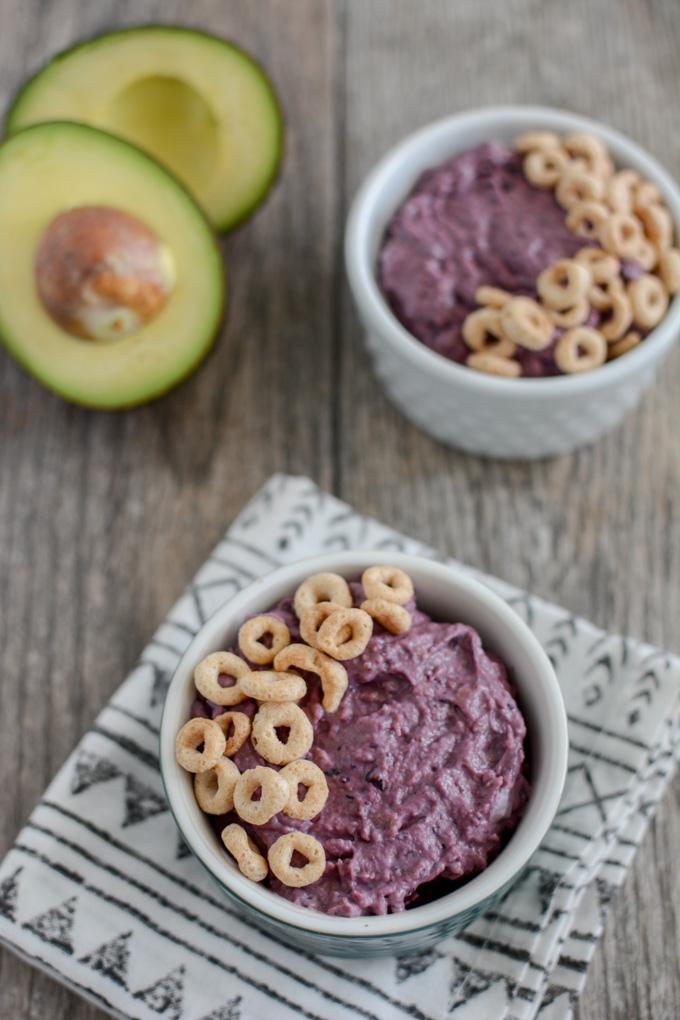 This Blueberry Avocado Smoothie Bowl is packed with nutritious and healthy first foods to give your baby! Plus it's super thick to help them practice their self-feeding skills.
