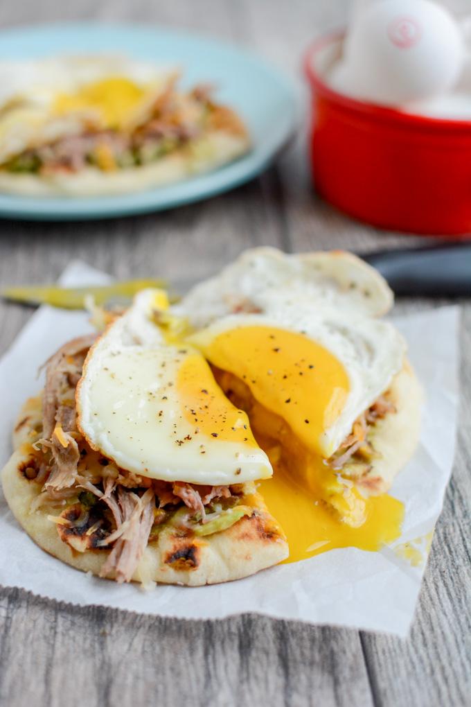 Pork and Egg Breakfast Pizza 6 This Pork and Egg Breakfast Pizza is perfect for a late morning football party or tailgating. Cook the pork overnight, then just shred, assemble and top with an egg!