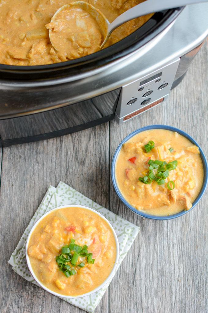 This Slow Cooker Creamy Pumpkin Chicken is the perfect easy fall dinner recipe. Throw all the ingredients in the crockpot, let it simmer and serve!