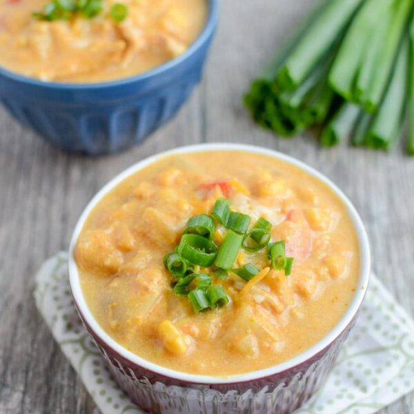 This Slow Cooker Creamy Pumpkin Chicken is the perfect easy fall dinner recipe. Throw all the ingredients in the crockpot, let it simmer and serve!