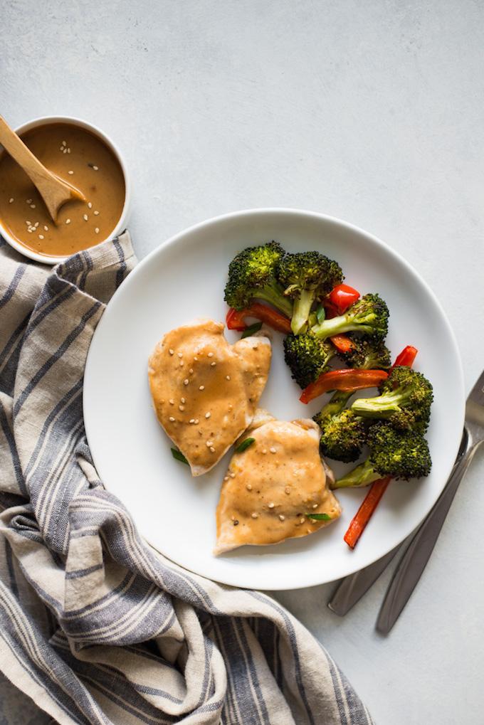 sheet pan chicken with vegetables broccoli and red peppers