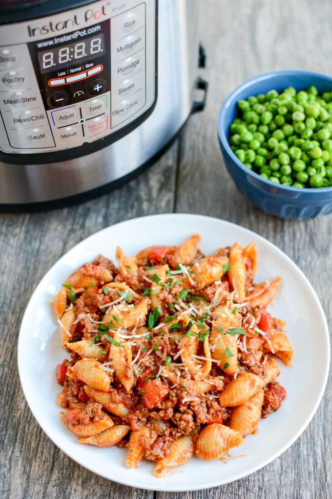 This Instant Pot Pasta with Meat Sauce is a simple, healthy dinner recipe the whole family will love!