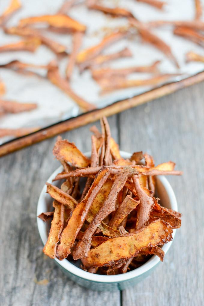 These Cinnamon Sugar Sweet Potato Peels are a fun dessert idea! Eat them as is, crumble over ice cream or yogurt or drizzle with chocolate for a sweet treat! 