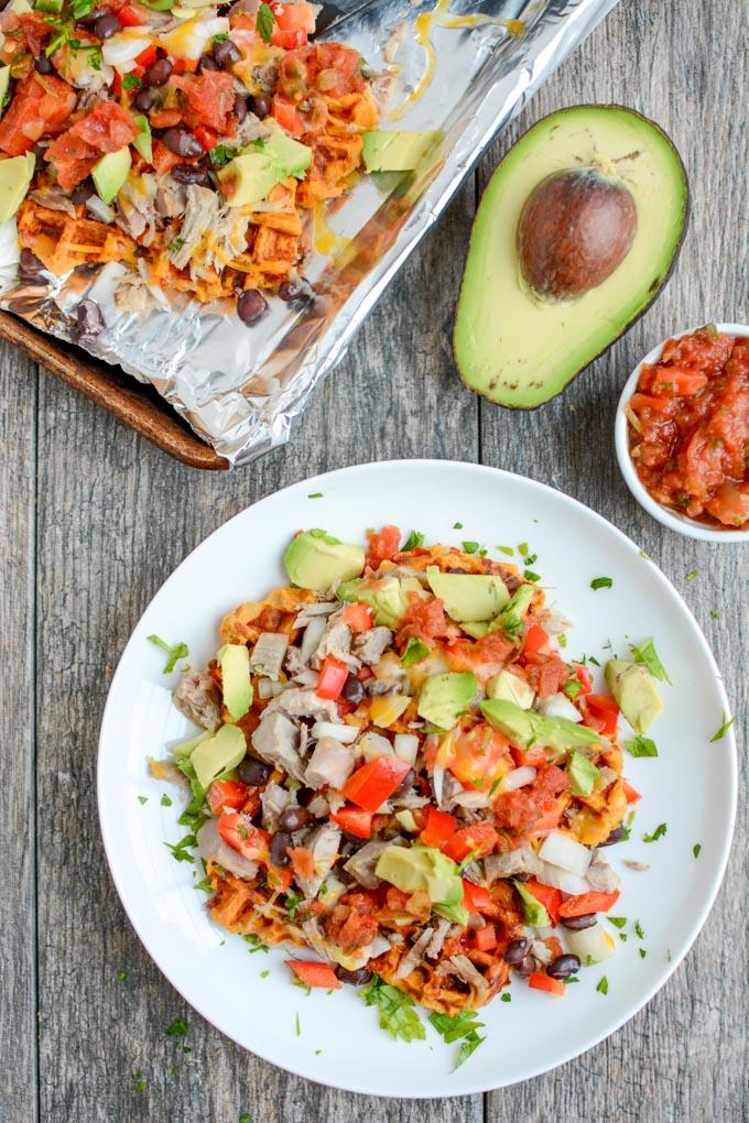 These easy Sweet Potato Waffle Nachos are a great way to transform leftover pulled pork or chicken into a healthy new lunch or dinner. This recipe would also make a great party appetizer!