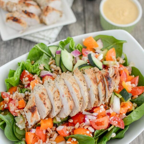 This Mediterranean Turkey Spinach Salad recipe is packed with protein and flavor! Prep the components ahead of time and assemble for a quick, healthy lunch or dinner!