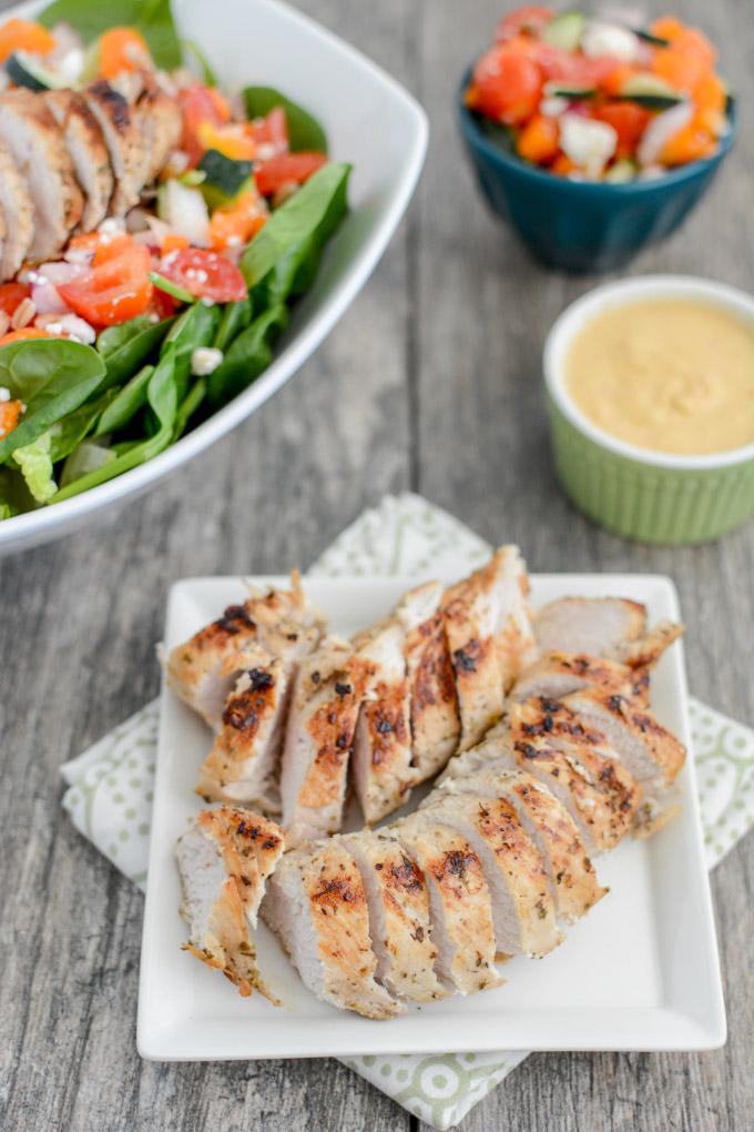 This Mediterranean Turkey Spinach Salad recipe is packed with protein and flavor! Prep the components ahead of time and assemble for a quick, healthy lunch or dinner!