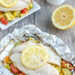 This recipe for Grilled Foil Packet Tilapia with Pesto Veggies is perfect for a summer dinner! It's quick, easy and healthy, plus cleanup is a breeze!