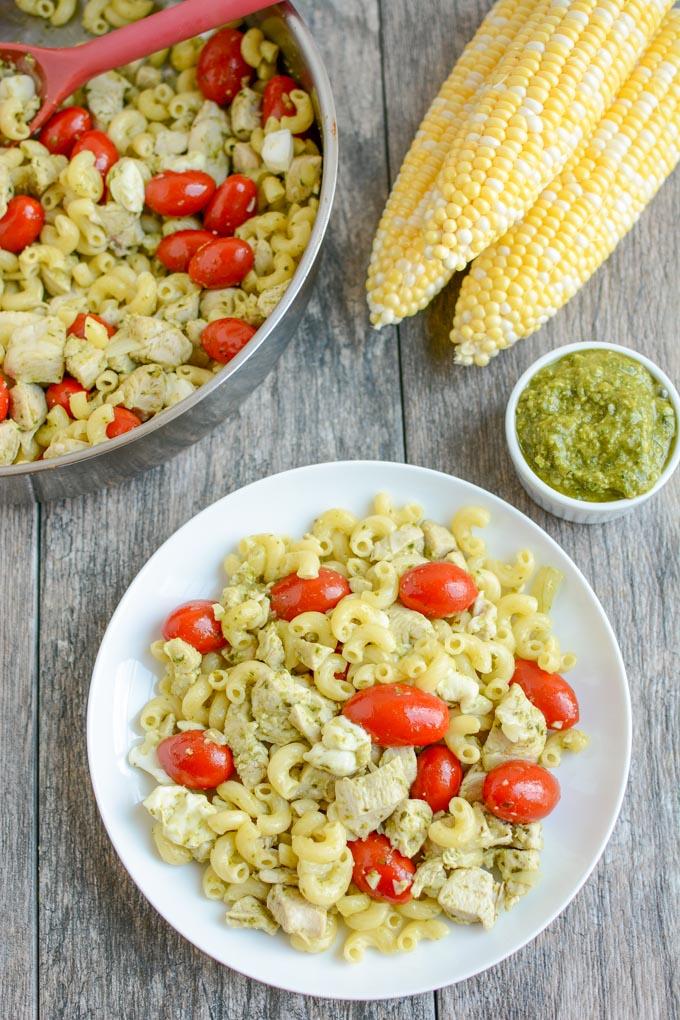 This Pesto Chicken Caprese Pasta is perfect for your next food prep session. It can be made ahead of time for a quick and healthy lunch or dinner that can be eaten warm or cold!