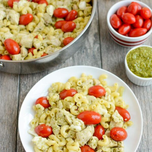 This Pesto Chicken Caprese Pasta is perfect for your next food prep session. It can be made ahead of time for a quick and healthy lunch or dinner that can be eaten warm or cold!