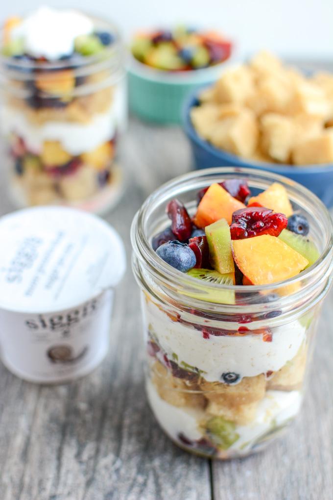 These Vanilla Cake Parfaits are the perfect dessert. Adults and kids will love the layers of cake cubes, yogurt and fresh fruit. Assemble it ahead of time or set up a DIY parfait bar and let people build their own!