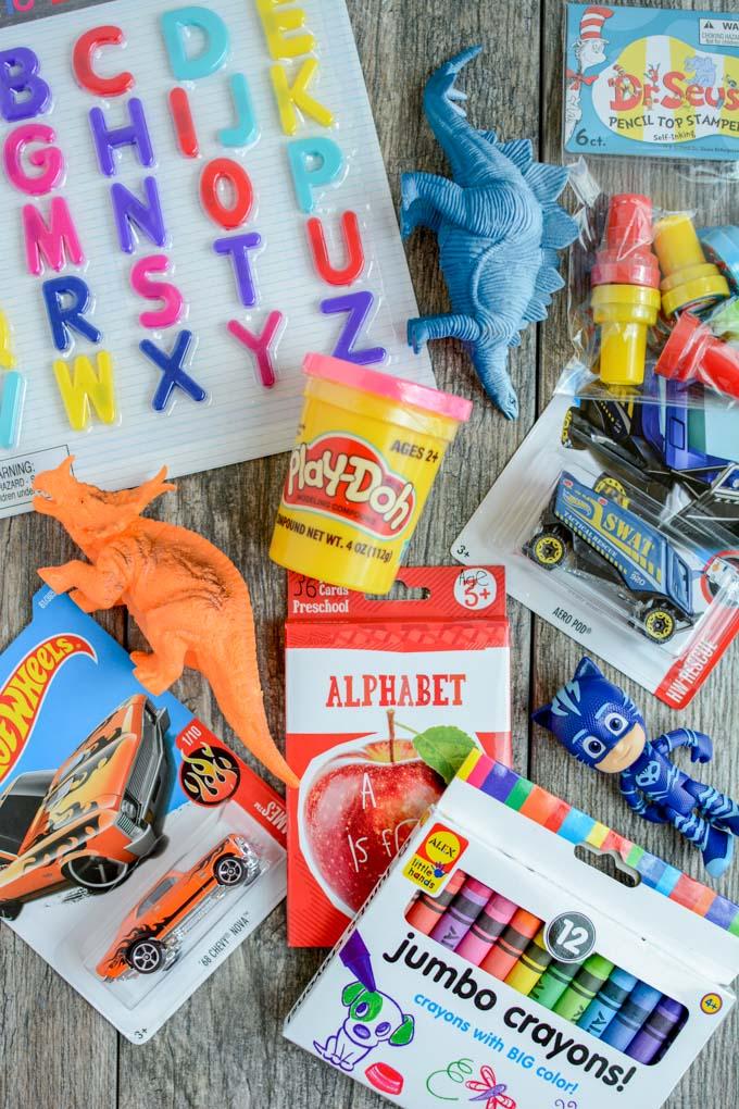 How To Make A Busy Box For Toddlers 76 Learn how to make a busy box for toddlers. These boxes are easy to customize and perfect for keeping toddlers occupied at a restaurant, on a plane, while mom is nursing and more!