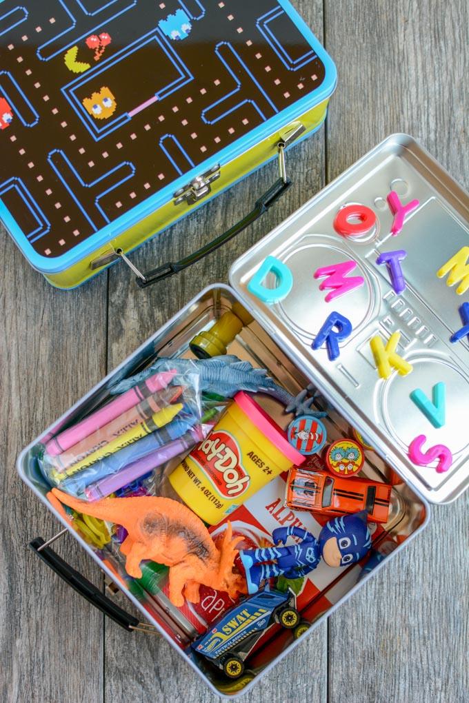 How To Make A Busy Box For Toddlers 78 Learn how to make a busy box for toddlers. These boxes are easy to customize and perfect for keeping toddlers occupied at a restaurant, on a plane, while mom is nursing and more!