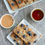 These Banana Baked Oatmeal French Toast Sticks are a healthy, kid-friendly breakfast recipe. They can even be made ahead of time, stored in the freezer and reheated in the microwave!
