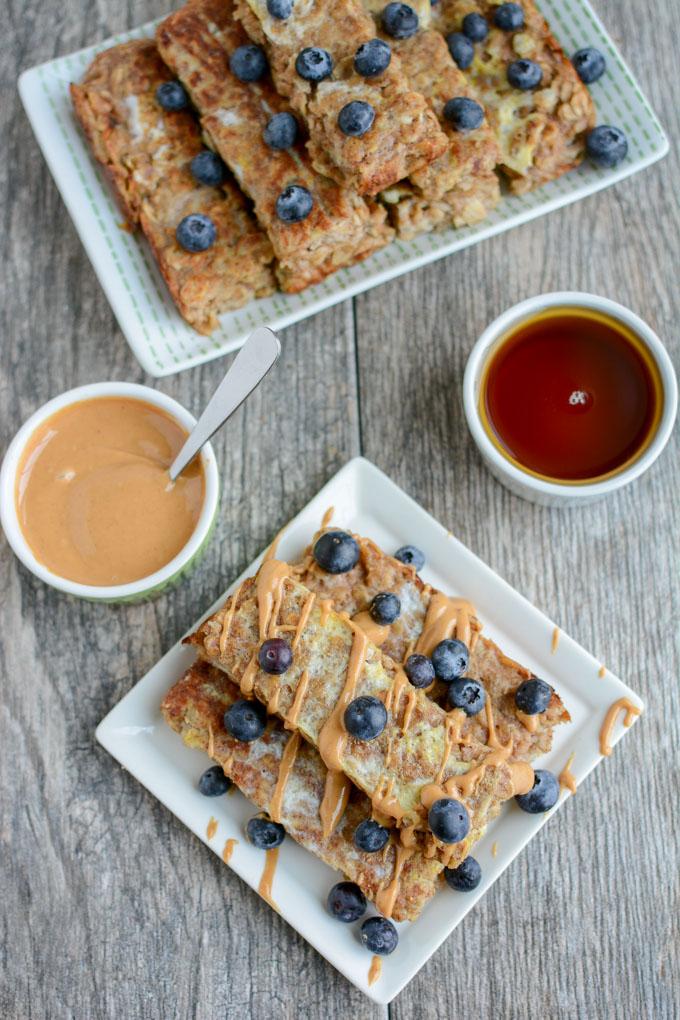 These Banana Baked Oatmeal French Toast Sticks are a healthy, kid-friendly breakfast recipe. They can even be made ahead of time, stored in the freezer and reheated in the microwave!