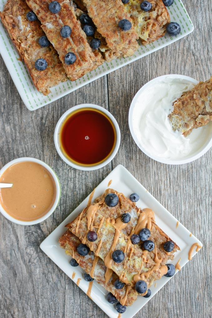 These Banana Baked Oatmeal French Toast Sticks are a healthy, kid-friendly breakfast recipe. They can even be made ahead of time, stored in the freezer and reheated in the microwave!