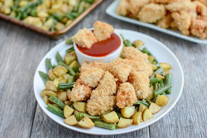 These Crispy Chicken Potato Bowls with Sweet Sweet and Spicy Ketchup are cooked on a sheet pan for an easy, healthy dinner recipe the whole family will love. 