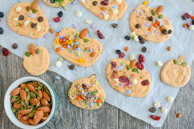 Yogurt mixed with pumpkin, shaped into pumpkins and decorated with candy