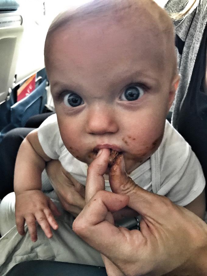 Kid With Candy On An Airplane