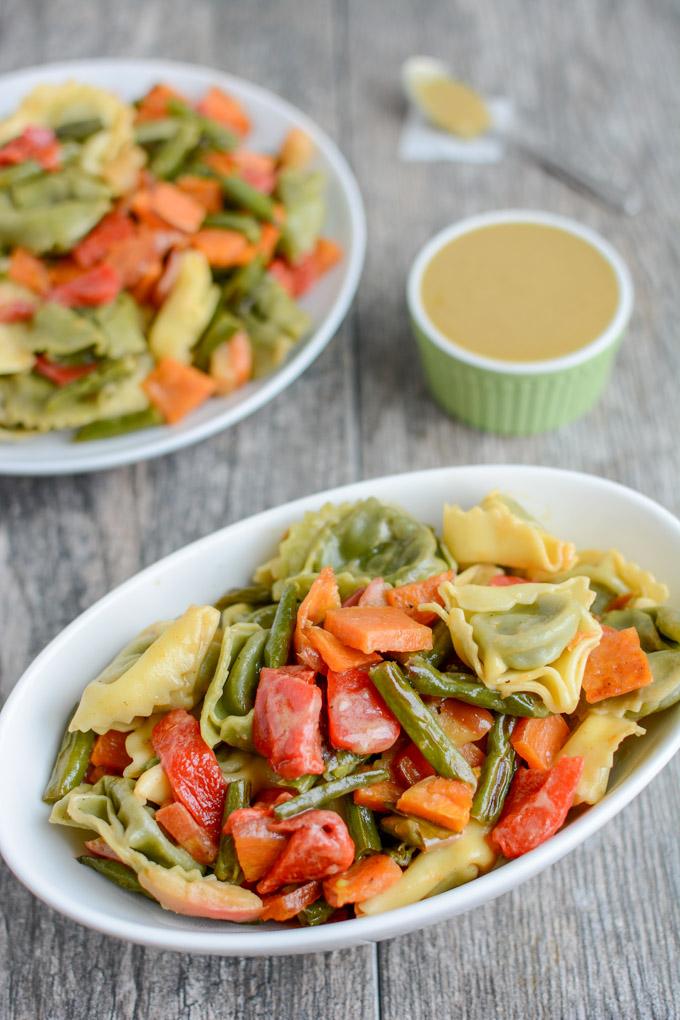 This Roasted Vegetable Pasta Salad with Maple Mustard Dressing is a simple, healthy vegetarian recipe. Serve it as an easy dinner side dish and pack the leftovers for lunch!