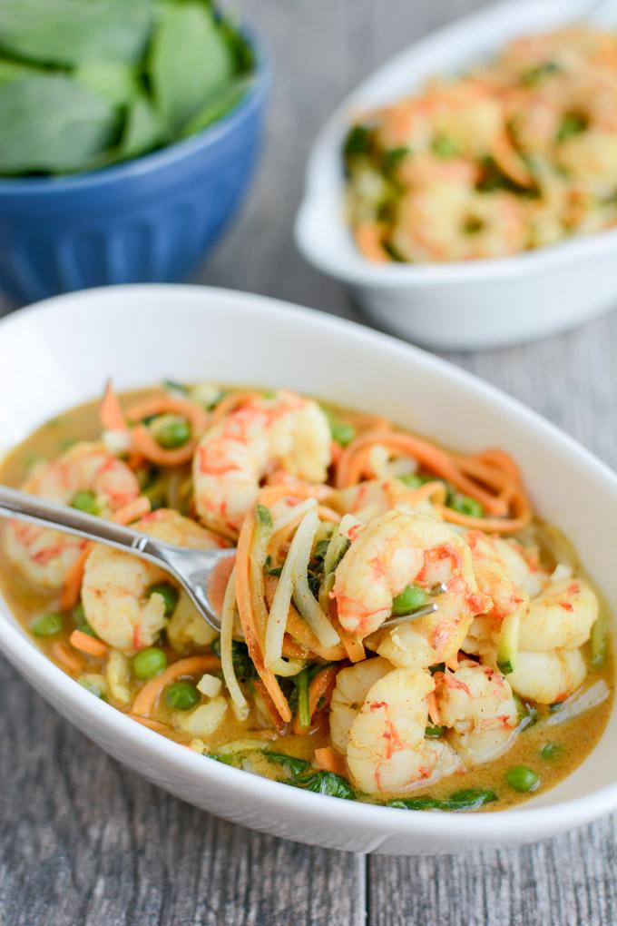 This recipe for Shrimp Curry Noodle Bowls is quick, healthy and perfect for dinner on a busy night. Ready in 15 minutes, it's packed with veggies and full of flavor!