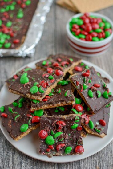 This Graham Cracker Toffee Squares recipe is a Christmas cookie tray staple! Everyone will love this classic dessert and it's the perfect quick, easy holiday treat!