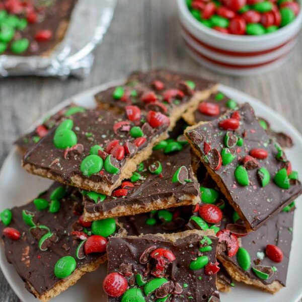 This Graham Cracker Toffee Squares recipe is a Christmas cookie tray staple! Everyone will love this classic dessert and it's the perfect quick, easy holiday treat!
