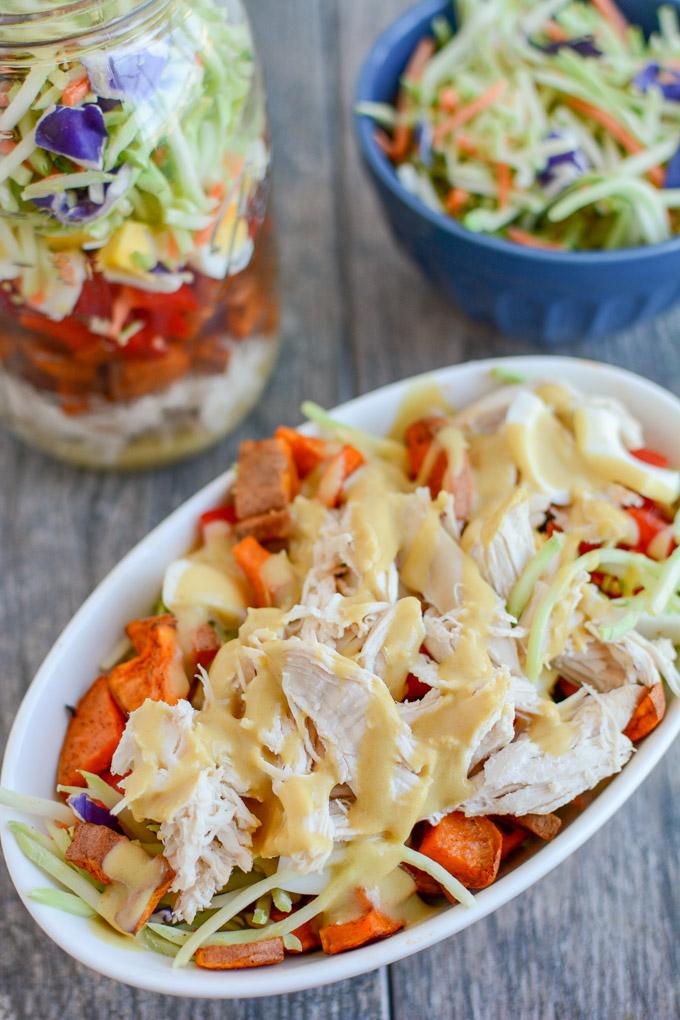 This Broccoli Slaw Salad in a Jar is the perfect packable lunch! Transform leftover chicken into an easy, healthy lunch option that can be prepped ahead of time for a busy week!