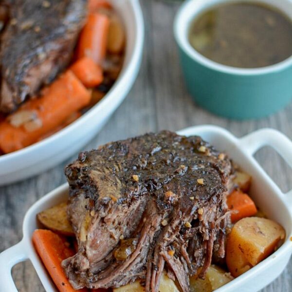 This Slow Cooker Balsamic Pot Roast is an easy, healthy dinner option for a busy night. Beef, potatoes and carrots cook all day for a balanced meal that's ready when you walk in the door.