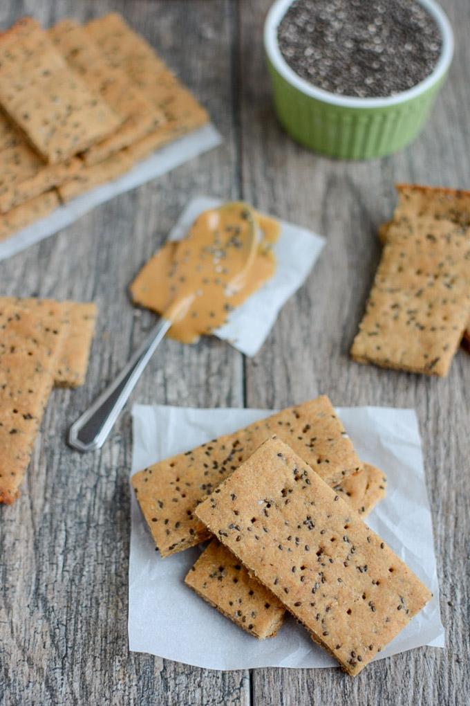 These Peanut Butter Chia Crackers are a healthy, kid-friendly snack recipe made with just a few simple ingredients. Make a batch for an after-school snack or pack some in your purse for a busy day!