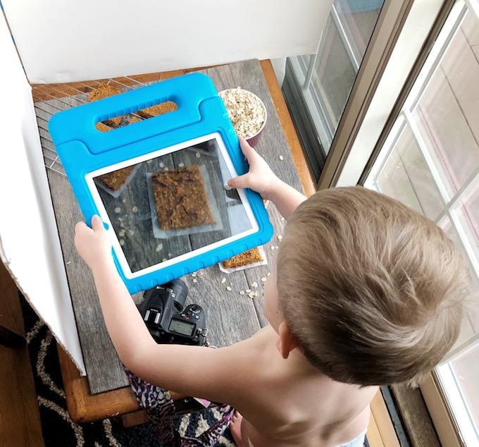 toddler doing food photography