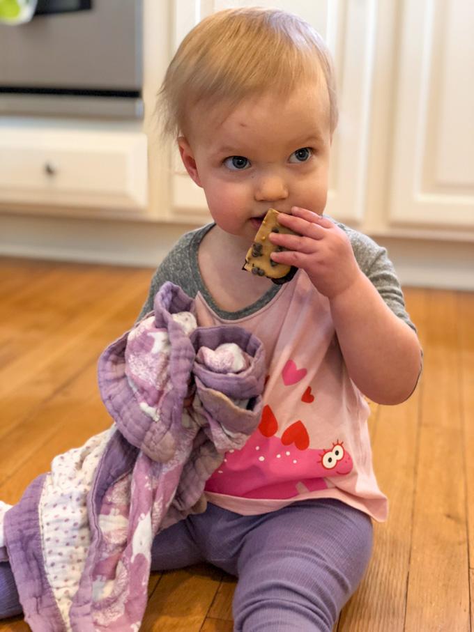 Toddler eating Frozen Layered Brownie Bars