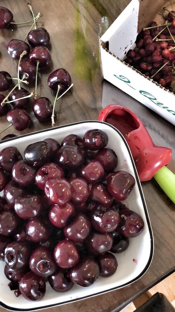 pitting sweet cherries to freeze